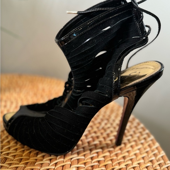 Size 7. Suede heel. Ties up the back. 3 1/2 inch heel - Picture 4 of 5